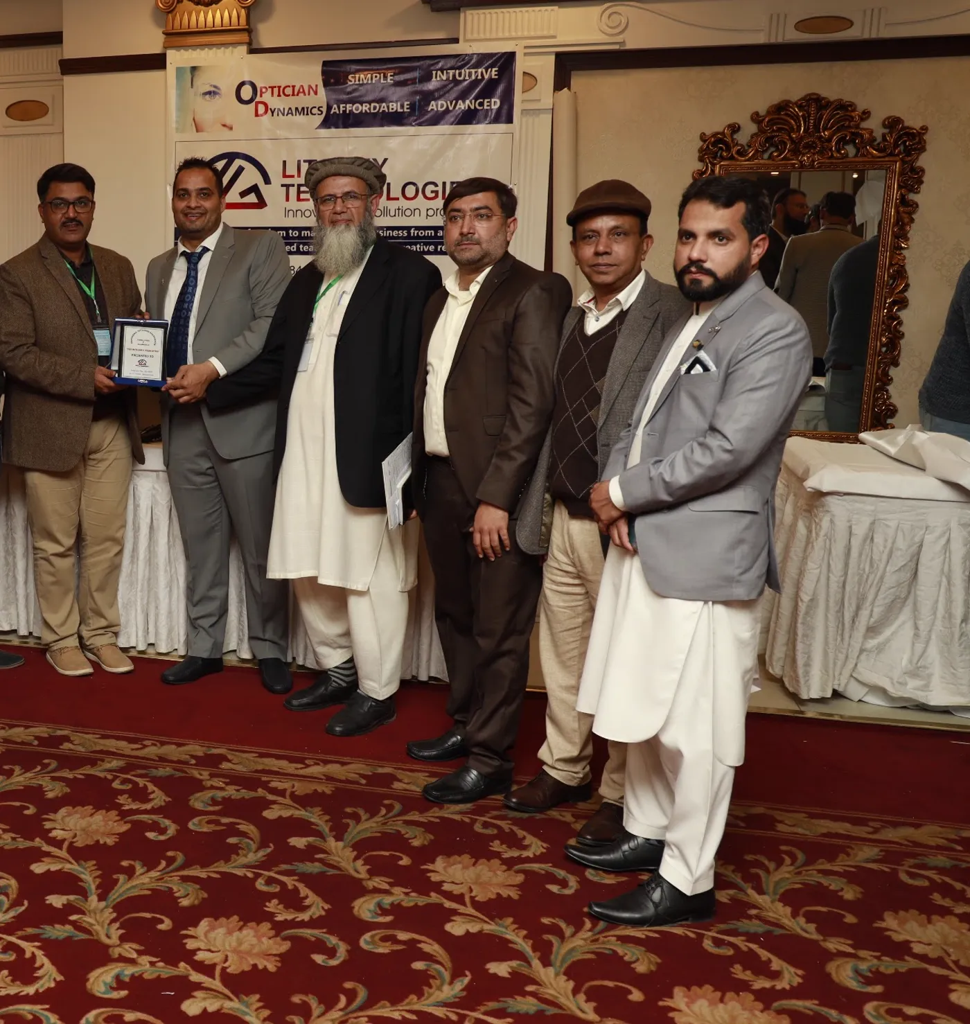Association members with the LitGrey Technologies team after the shield presentation